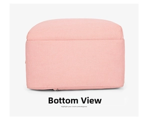 Detailed view of the flat bottom structure and fabric texture on a pink oxford diaper bag