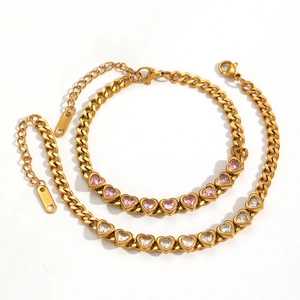 Goldenes Edelstahl-NK-Panzerarmband mit rosa und weißen herzförmigen Zirkoniasteinen