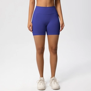 Close-up of high-waist royal blue seamless yoga shorts showing ribbed elastic fabric detail