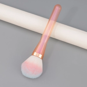 Gradient pink makeup brush for powder and blush with a pearlized iridescent handle