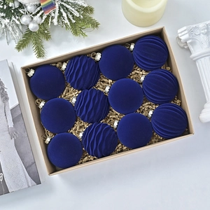 Detailed view of 12-piece dark blue flocked Christmas balls with ribbed and smooth textures