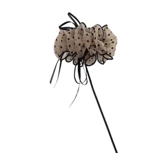 Elegant beige polka dot mesh hair scrunchie with black silk ribbon bow for women