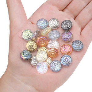 Macro shot of assorted colorful spiral crystal glass beads for jewelry making