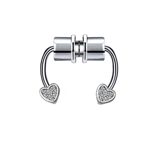 Macro detail of silver magnetic horseshoe nose ring with heart shape and white zircon