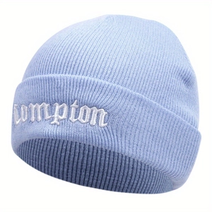 Light blue knit beanie featuring white Gothic Compton embroidery on a ribbed fold-over cuff