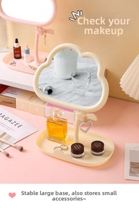 Cream-colored cloud makeup mirror with jewelry storage tray and star bracket decor