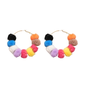 Colorful plush pom-pom hoop earrings with silver needle in a minimalist circle design