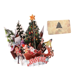 3D pop-up Christmas card featuring Santa Claus, reindeer, and a festive holiday tree