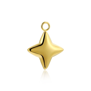 Macro detail of a 18k gold-plated four-pointed star pendant with polished finish