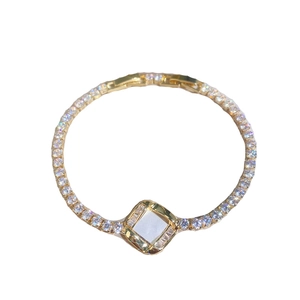 Gold-plated chain bracelet with square crystal centerpiece and round zircon accents