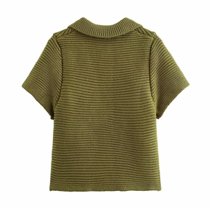 Detail view of olive green chunky knit short sleeve top with textured rib pattern