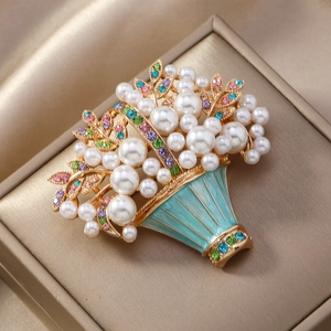 Vintage enamel flower basket brooch with colorful rhinestones and white pearls