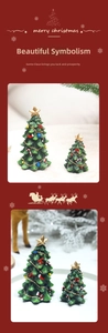 Close-up of resin mini Christmas trees with gold stars, candy canes and ornaments