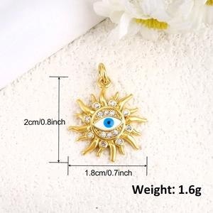 Detailed size view of a gold sun pendant with blue devil eye and white zircon inlay
