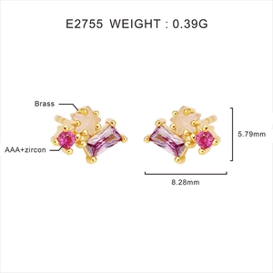 Detail of 18k gold plated brass stud earrings with pink and purple zircon stones