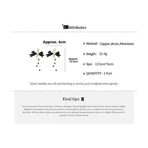 Detail specifications of long black bow tassel earrings with pearls and rhinestones