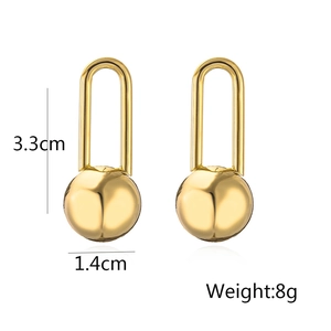 Detailed view of U-shaped gold earrings with metal sphere showing 3.3cm size dimensions