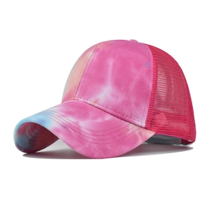 Detailed side view of pink tie-dye ponytail sun hat with breathable mesh back and neat stitching