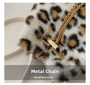 Close-up of leopard print plush bucket bag featuring premium gold metal chain strap