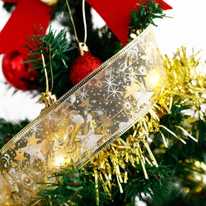 Close-up of 4m gold double-layer ribbon LED lights with stars on a Christmas tree