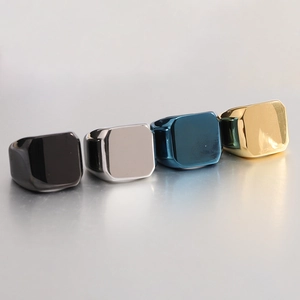 Polished square signet rings in black, silver, blue, and gold finishes for engraving