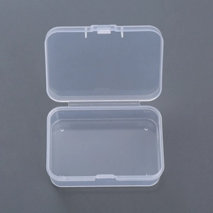 Rectangular transparent plastic storage box with flip-top lid for small accessories