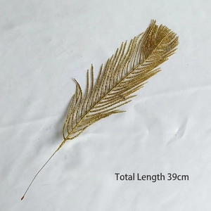 Detail of 39cm gold glitter artificial leaf branch for festive Christmas decoration