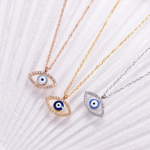 Evil Eye pendant necklaces in gold, rose gold and silver finish with blue enamel and crystals