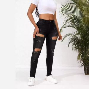 Jean noir taille haute déchiré pour femme coupe ajustée et extensible style skinny