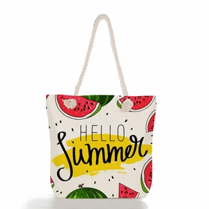 Large summer canvas tote bag with watermelon print and rope handles for beach use