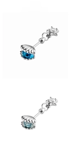 Detail of star-shaped titanium steel studs with colorful shell and gemstone inlays