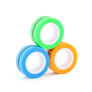 Three magnetic fidget rings in green, blue, and orange on a white background