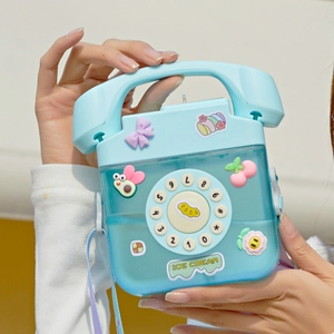 Blue retro telephone-shaped water bottle detail with cute 3D stickers and shoulder strap