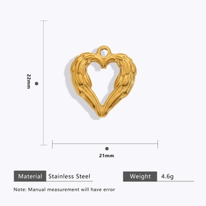 Detailed view of gold stainless steel heart wings pendant with 22mm by 21mm dimensions