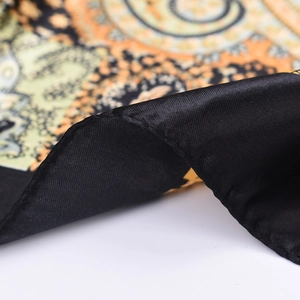 Classic paisley print silk scarf with luxury satin finish and fine edge stitching