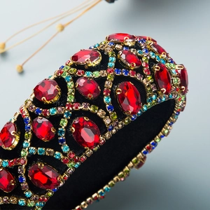 Macro shot of Baroque sponge headband with ruby crystals and luxury gold mesh detailing