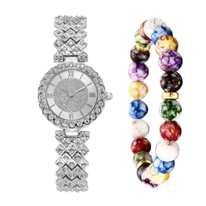 Detail of luxury rhinestone women's watch and colorful ink pattern beaded bracelet