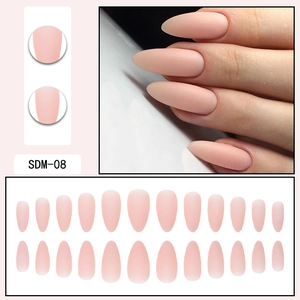 Close-up of matte light pink almond shaped press-on nails set including 24 pieces