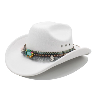Detail of white wide-brim cowboy hat with bohemian tassel and turquoise stone band