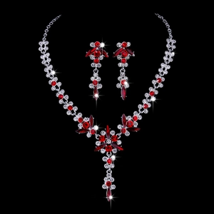 Detail of bridal necklace set with red marquise crystals and sparkling clear rhinestones