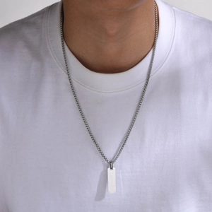 Polished stainless steel rectangular dog tag pendant on a fine silver chain necklace