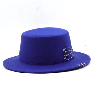Royal blue flat top wool felt hat with silver safety pins and metal rings streetwear style