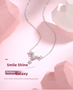 Detail showing 925 silver star pendant necklace with sparkling cubic zirconia tassels