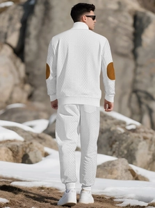 Men's white textured tracksuit set featuring brown suede elbow patches and outdoor knit detail