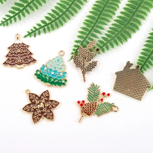 Detailed view of enamel alloy pendants featuring Christmas trees, snowflakes and pine cones