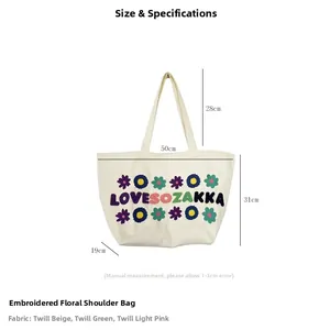 Detailed size specifications for the beige canvas tote bag with floral embroidery