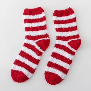 Thick red and white striped coral fleece thermal socks with soft plush texture