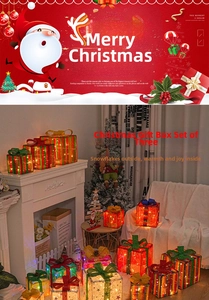 Detailed view of three sizes of LED Christmas gift box decorations with silk bows