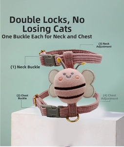 Detail view of pink corduroy cat harness with plush bee and adjustable gold metal buckles