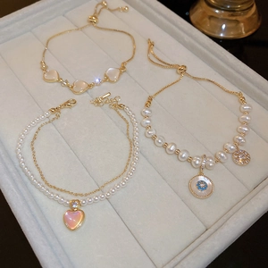 Adjustable gold plated bracelet set with opal flower heart charms and pearls
